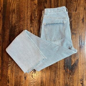 Light wash women’s straight leg jeans, frayed ends button up, thick material